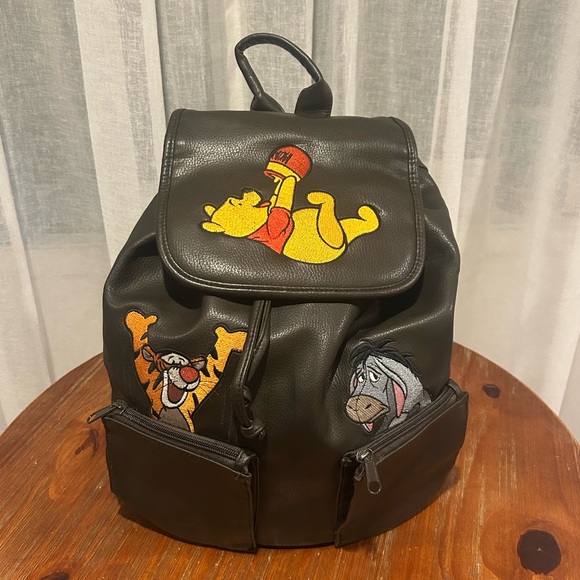 Disney Parks Winnie the Pooh Drawstring Leather Backpack - Picture 1 of 6